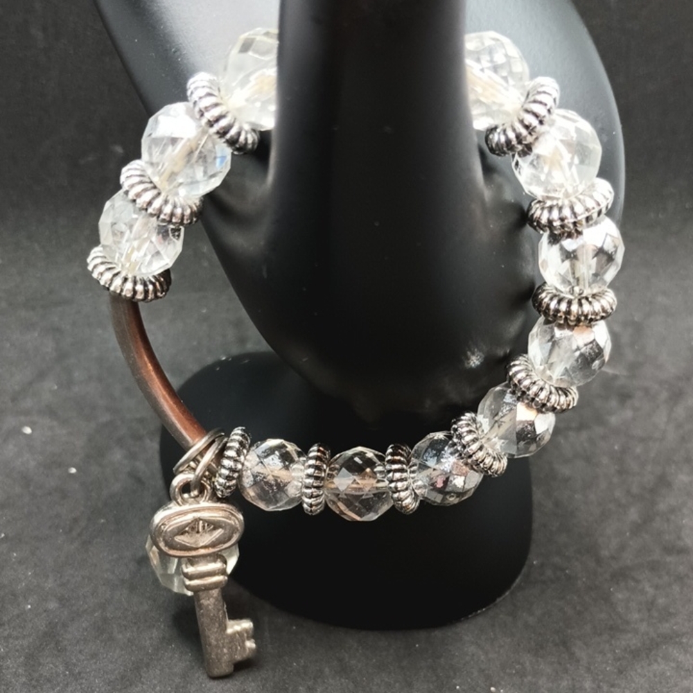 Elegant Silver Beaded Bracelet with Key Charm